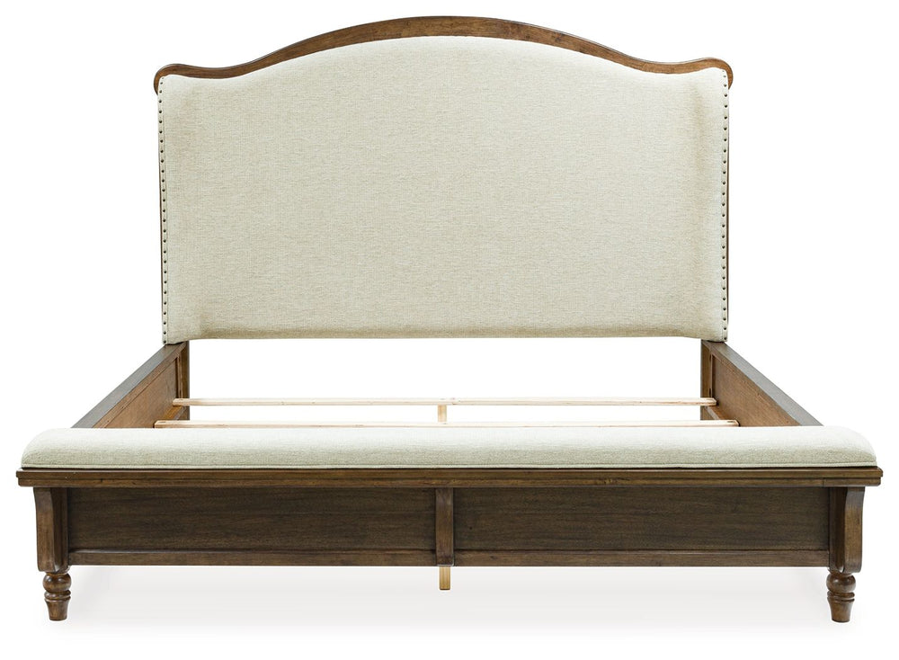 Sturlayne - California King Upholstered Panel Bed - Brown by Ashley Furniture product image