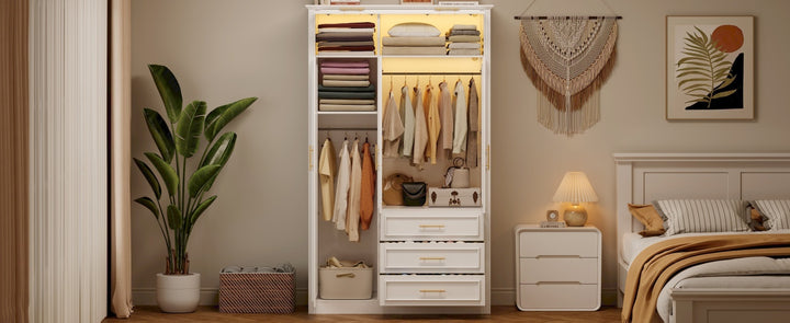 Wardrobe with glass doors, drawers, and hanging storage