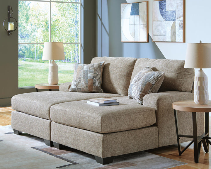 Newellen 3-Piece Sectional and Oversized Ottoman (11)