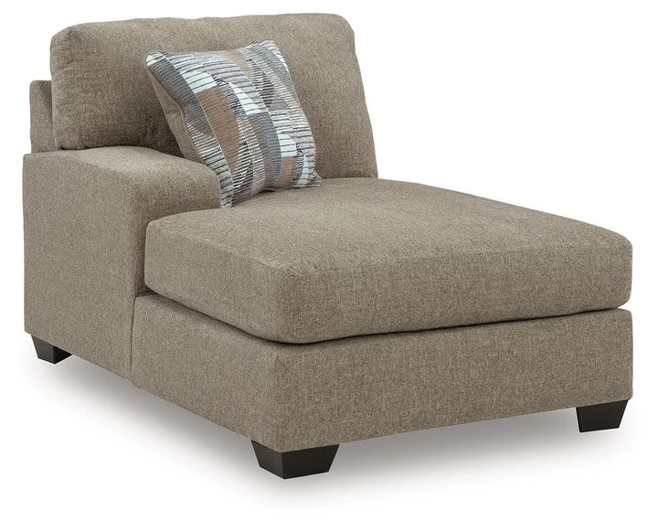 Newellen 3-Piece Sectional and Oversized Ottoman (4)