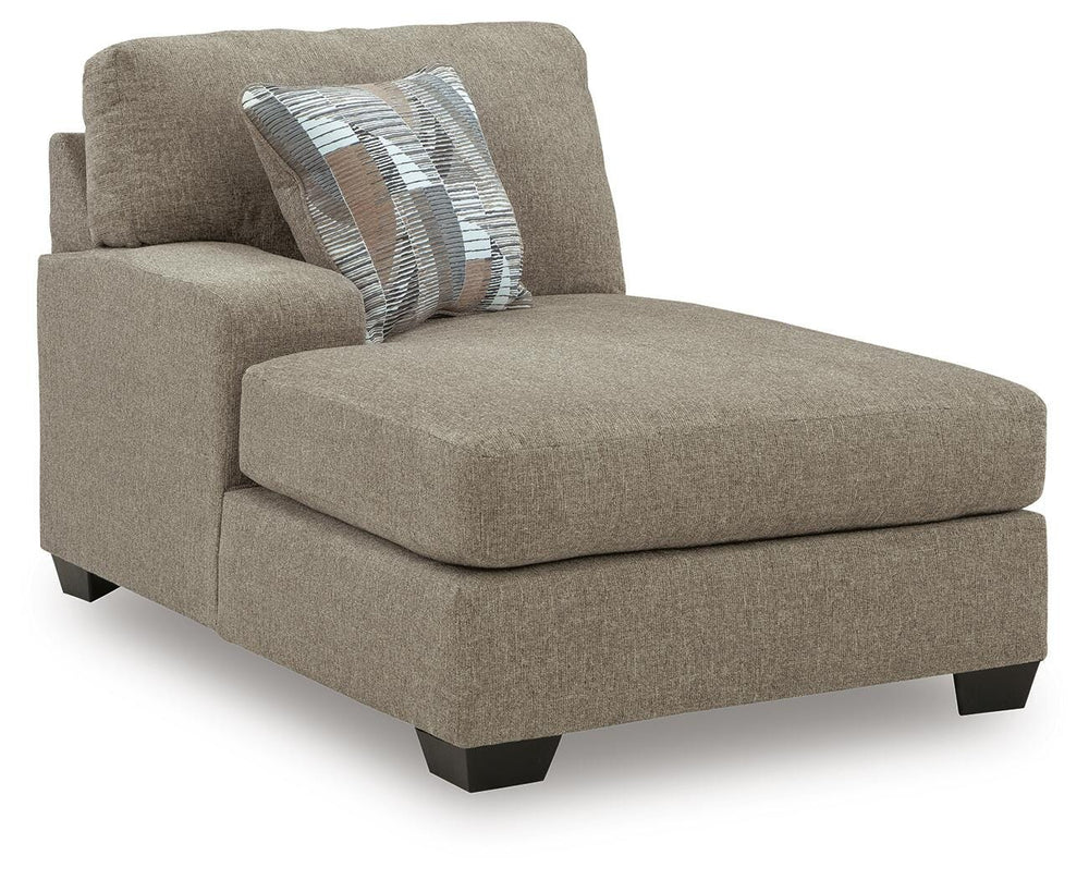 Newellen 3-Piece Sectional and Oversized Ottoman (4)