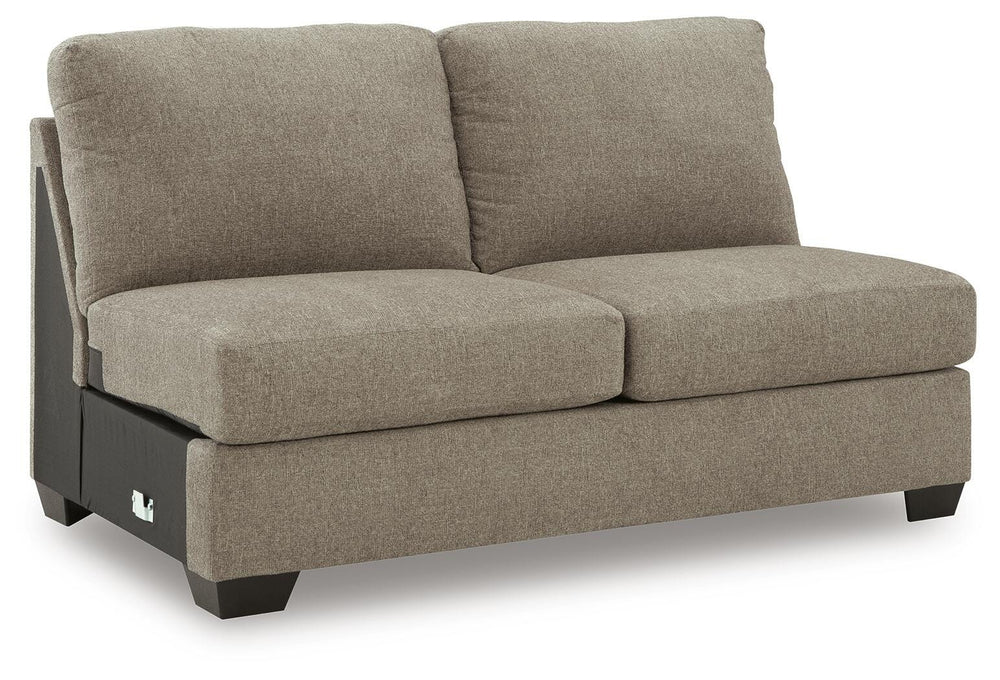 Newellen 3-Piece Sectional and Oversized Ottoman (6)