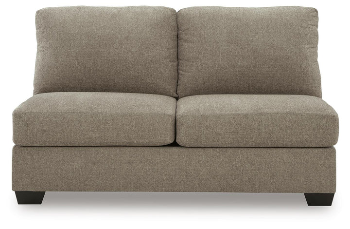 Newellen 3-Piece Sectional and Oversized Ottoman (5)