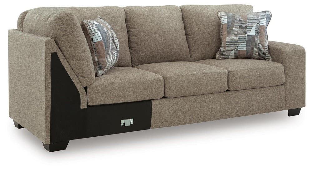 Newellen 3-Piece Sectional and Oversized Ottoman (7)