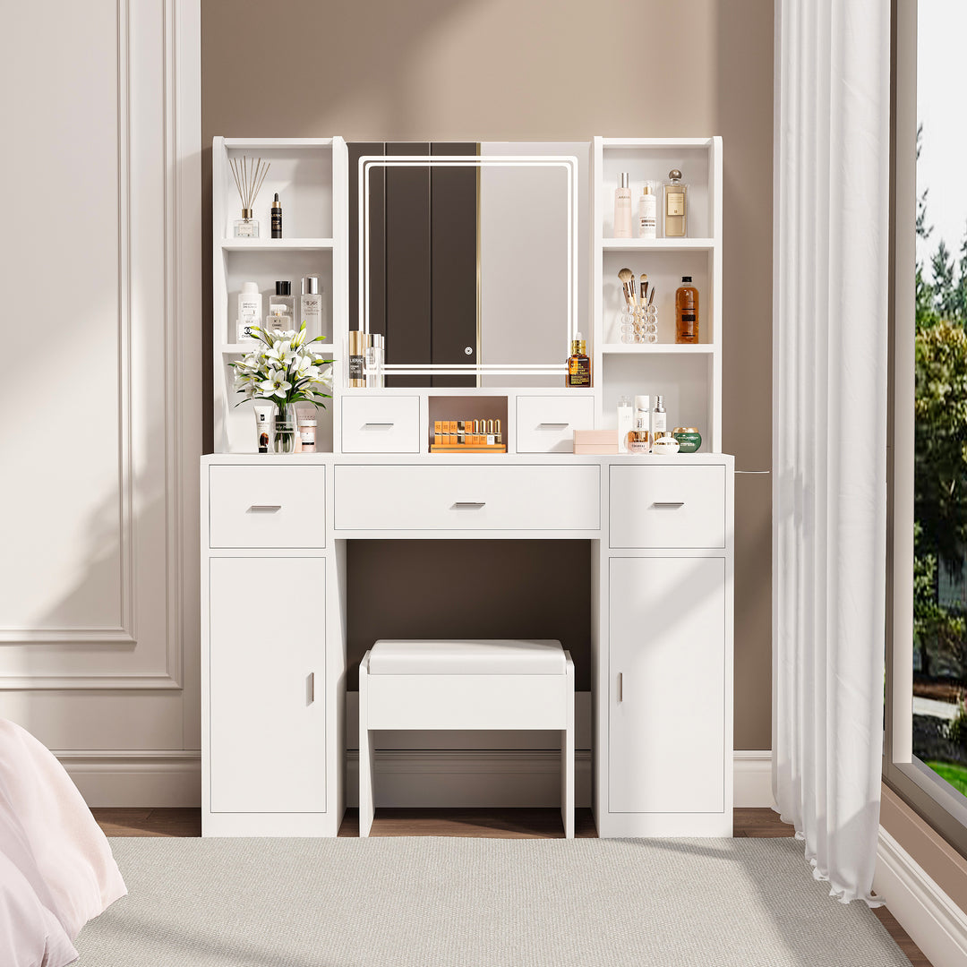 The white vanity with LED mirror is equipped with a hair dryer rack, and the vanity in the bedroom and dressing room is equipped with a dressing pad