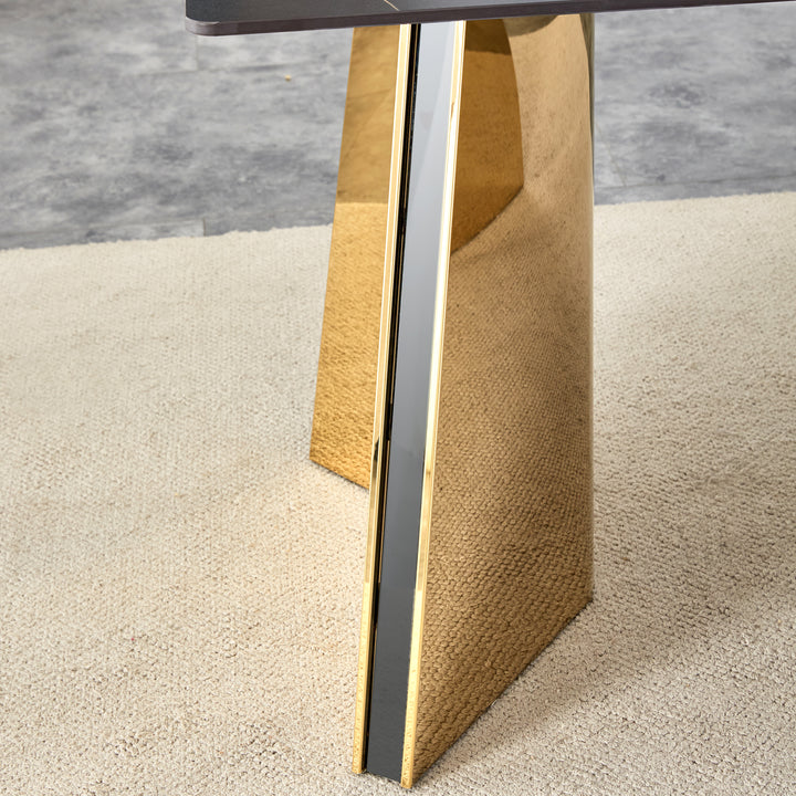 black-marble-patterned-slab-dining-table-with-golden-stainless-steel-butterfly-legs