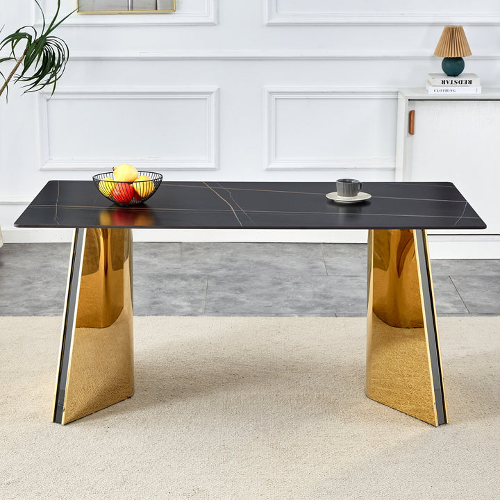 black-marble-patterned-slab-dining-table-with-golden-stainless-steel-butterfly-legs