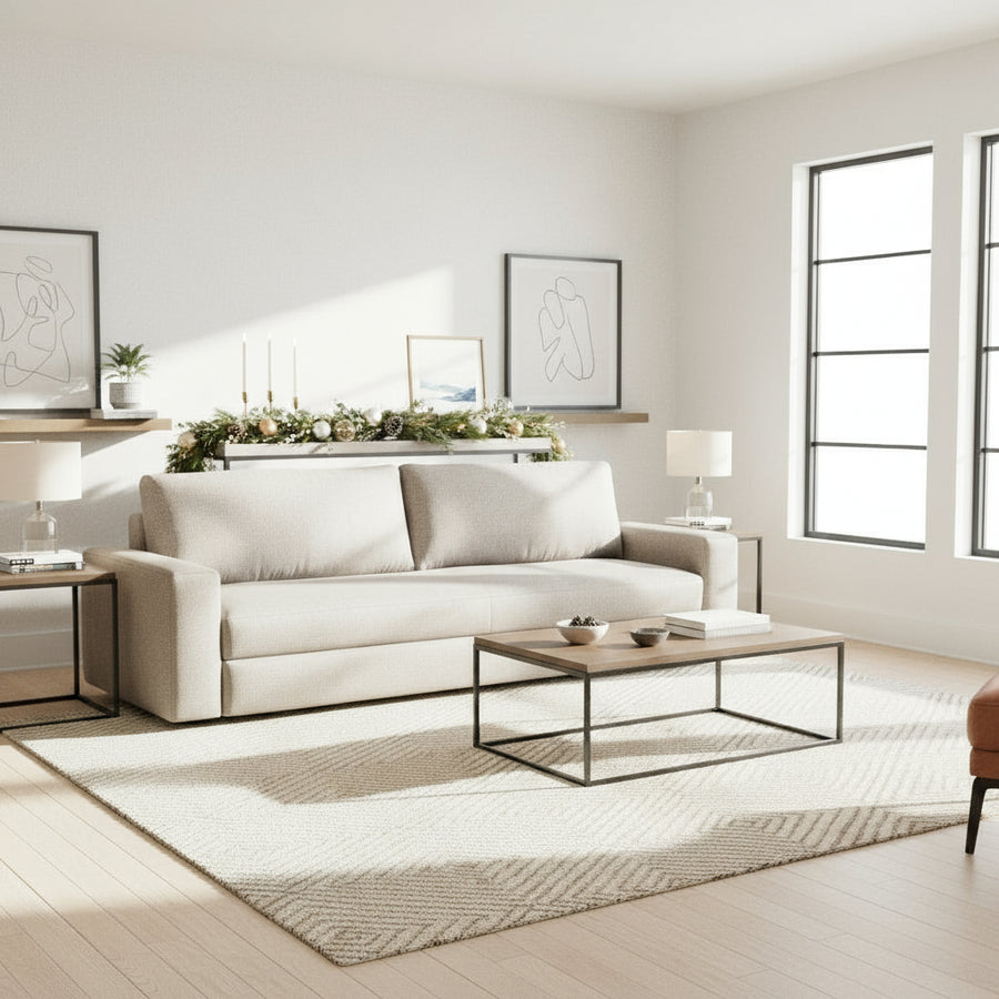 Gray sofa with decorative items on a white background