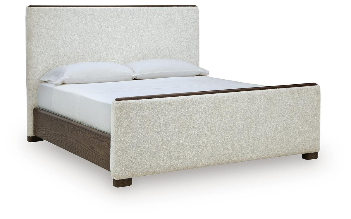 Radkin King Upholstered Panel Bed - Burnished Brown (1)