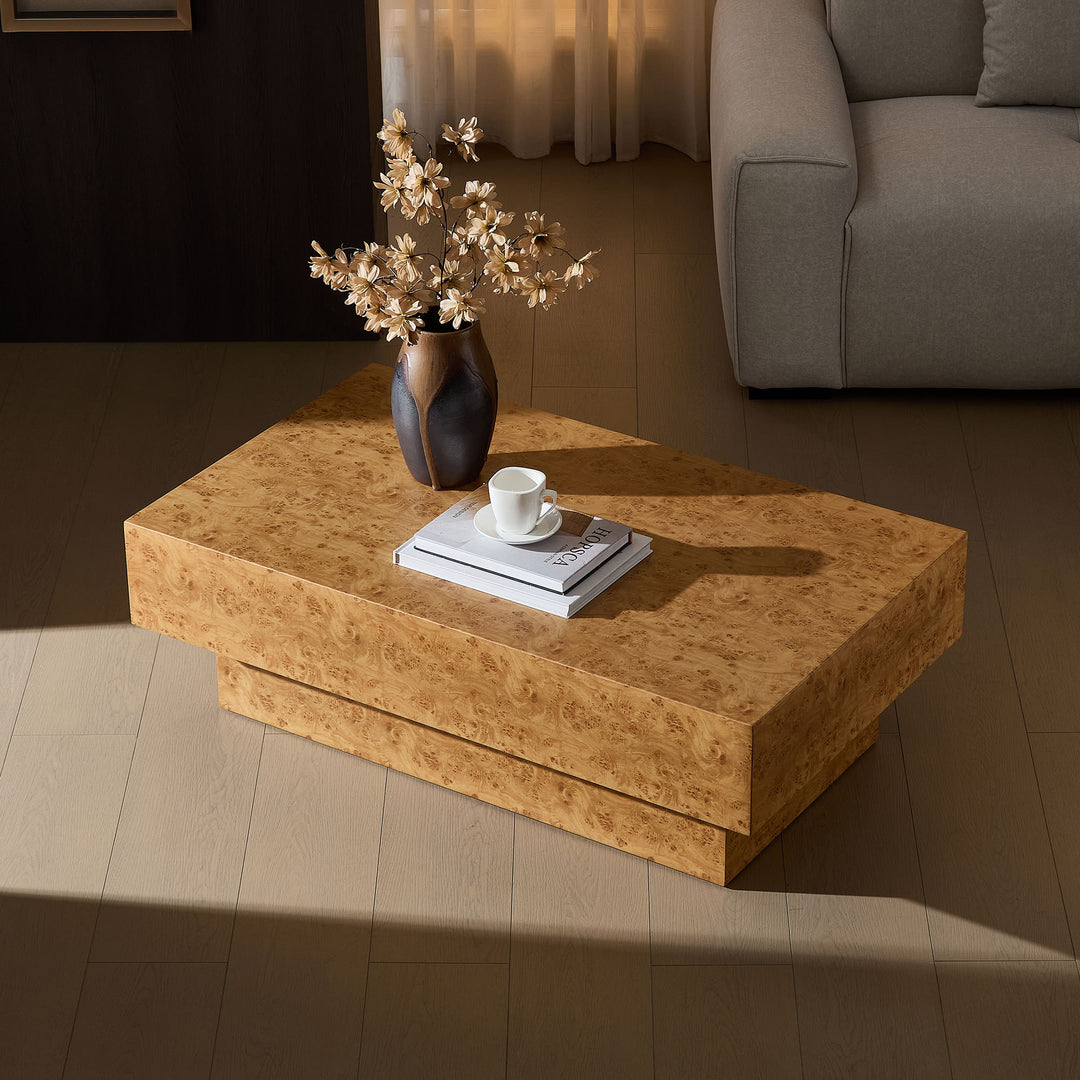 Close-up of faux burl wood grain and pedestal base