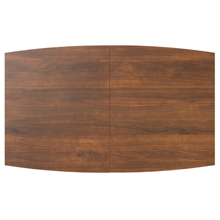 Elegant mid-century dining table in walnut veneer with hidden butterfly leaf.