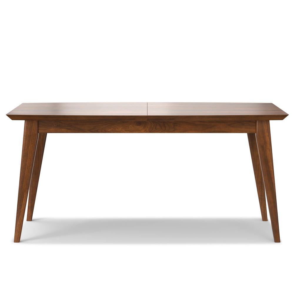 Elegant mid-century dining table in walnut veneer with hidden butterfly leaf.