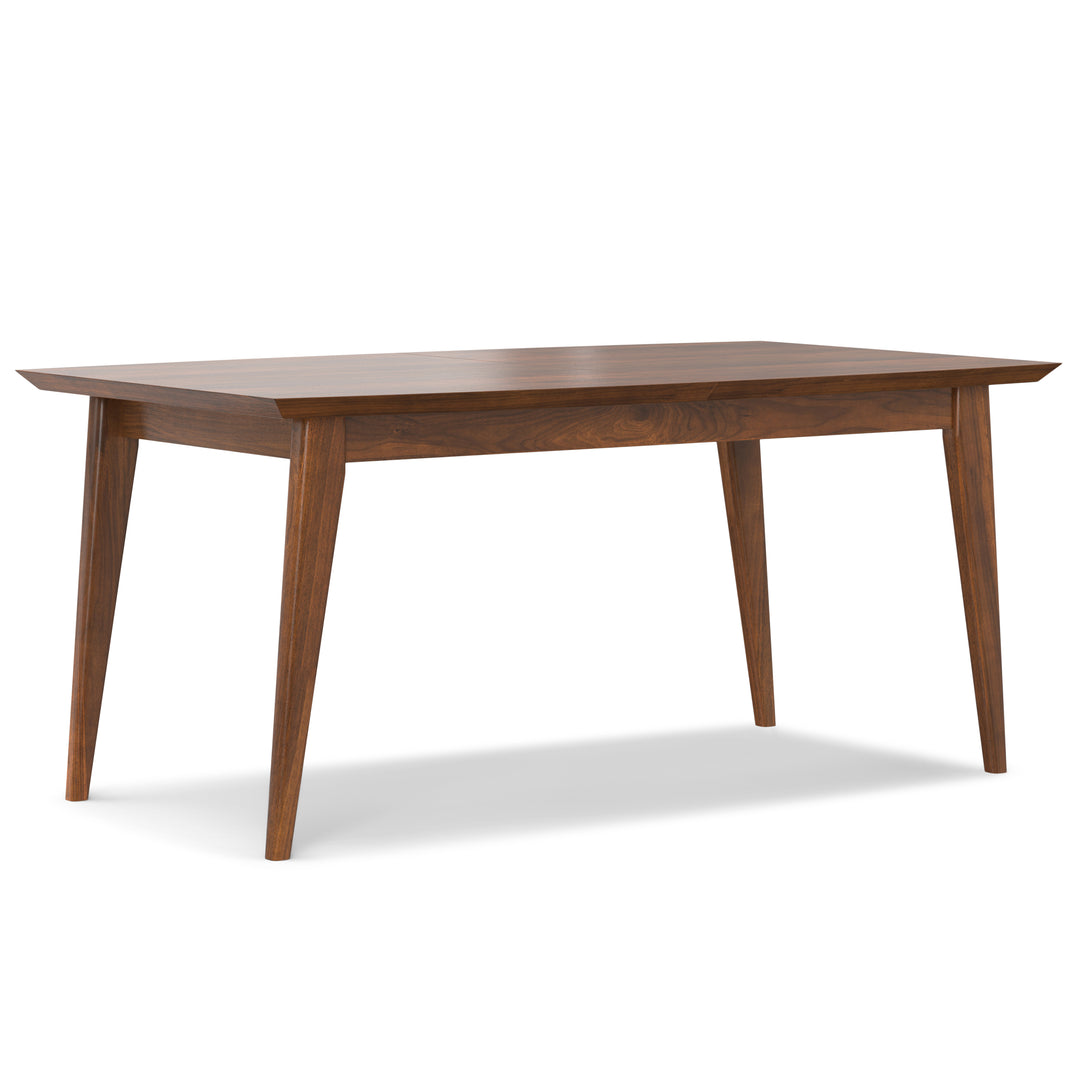 Elegant mid-century dining table in walnut veneer with hidden butterfly leaf.