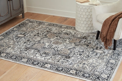r405822-ashley-furniture-gregmoore-52-x-610-washable-rug