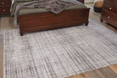 r405921-ashley-furniture-moorhill-77-x-98-washable-rug