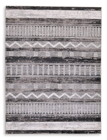 r405992-ashley-furniture-henchester-5-x-7-washable-rug