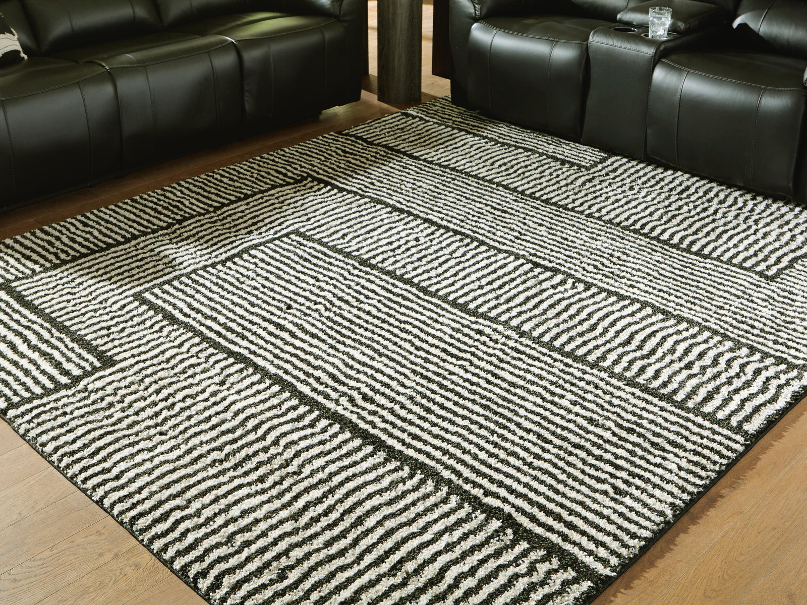 Kurtmen 7'10" x 9'10" Area Rug - Black (2)