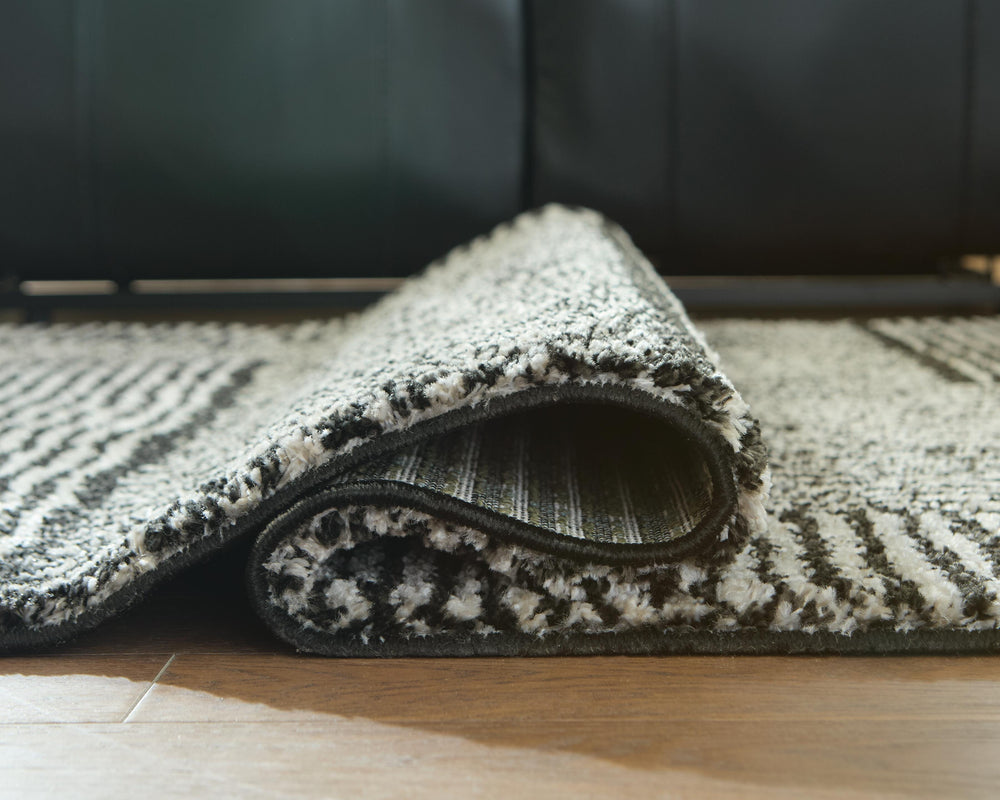 Kurtmen 5' x 7' Area Rug - Black (4)