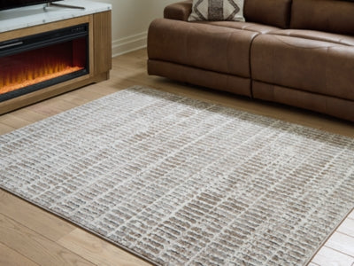 Fuadwick 5'3" x 7' Area Rug