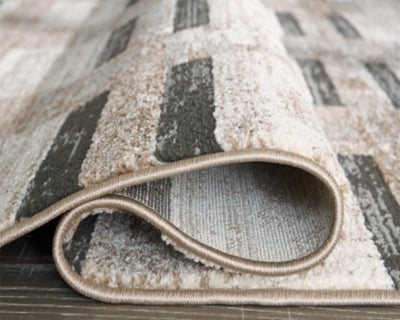 Alstone 5'3" x 7' Area Rug - Beige | Ashley Furniture