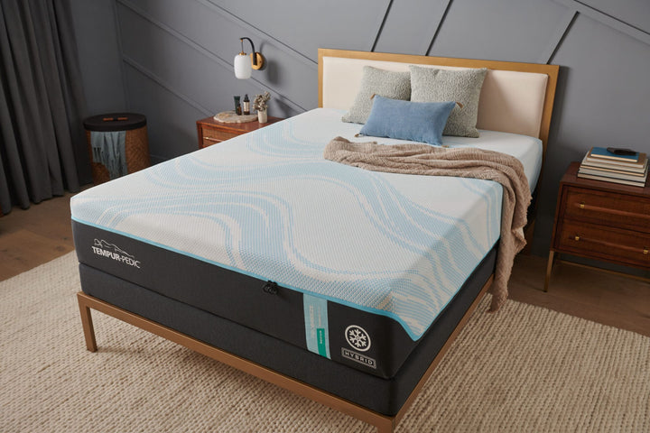 TEMPUR-ProBreeze Medium Hybrid Mattress in a bedroom