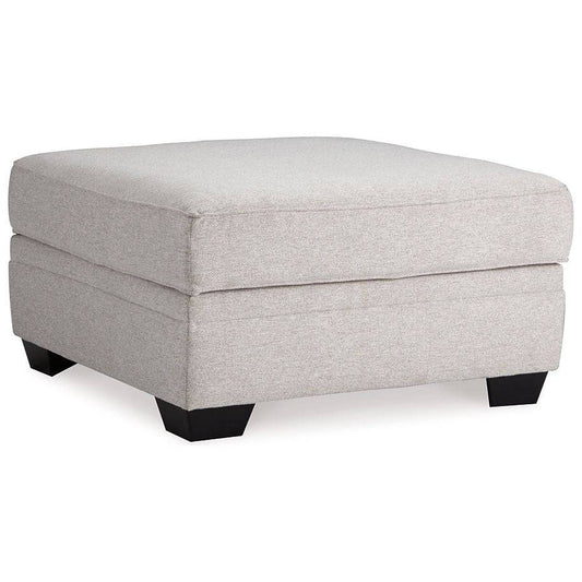 Benchcraft® Dellara Ottoman With Storage.