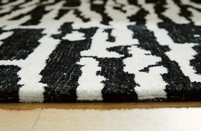 Bramshaw 5' x 7' Rug - Black Area Rug modern furniture Contempo Furniture