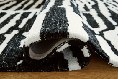 Bramshaw 5' x 7' Rug - Black Area Rug modern furniture Contempo Furniture