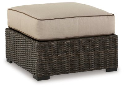 Coastline Bay Outdoor Ottoman with Cushion - Dark Brown | Ashley Furniture