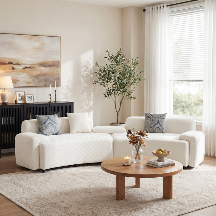 122" Curved Sofa with Damask Pillows – Light Beige