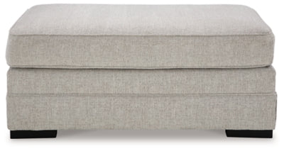 Eastonbridge Ottoman - Gray Upholstered Ottoman modern furniture Contempo Furniture