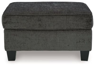 Erinslane Ottoman - Black Upholstered Ottoman modern furniture Contempo Furniture