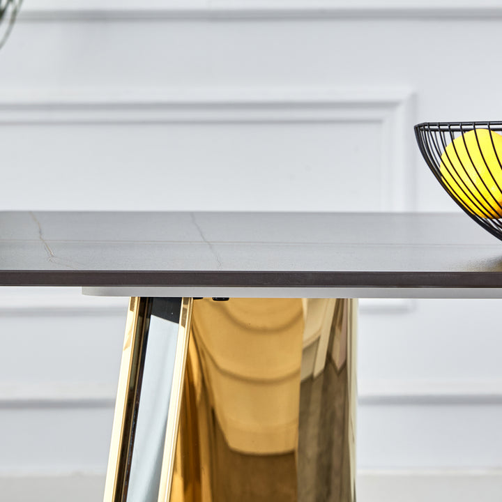 black-marble-patterned-slab-dining-table-with-golden-stainless-steel-butterfly-legs
