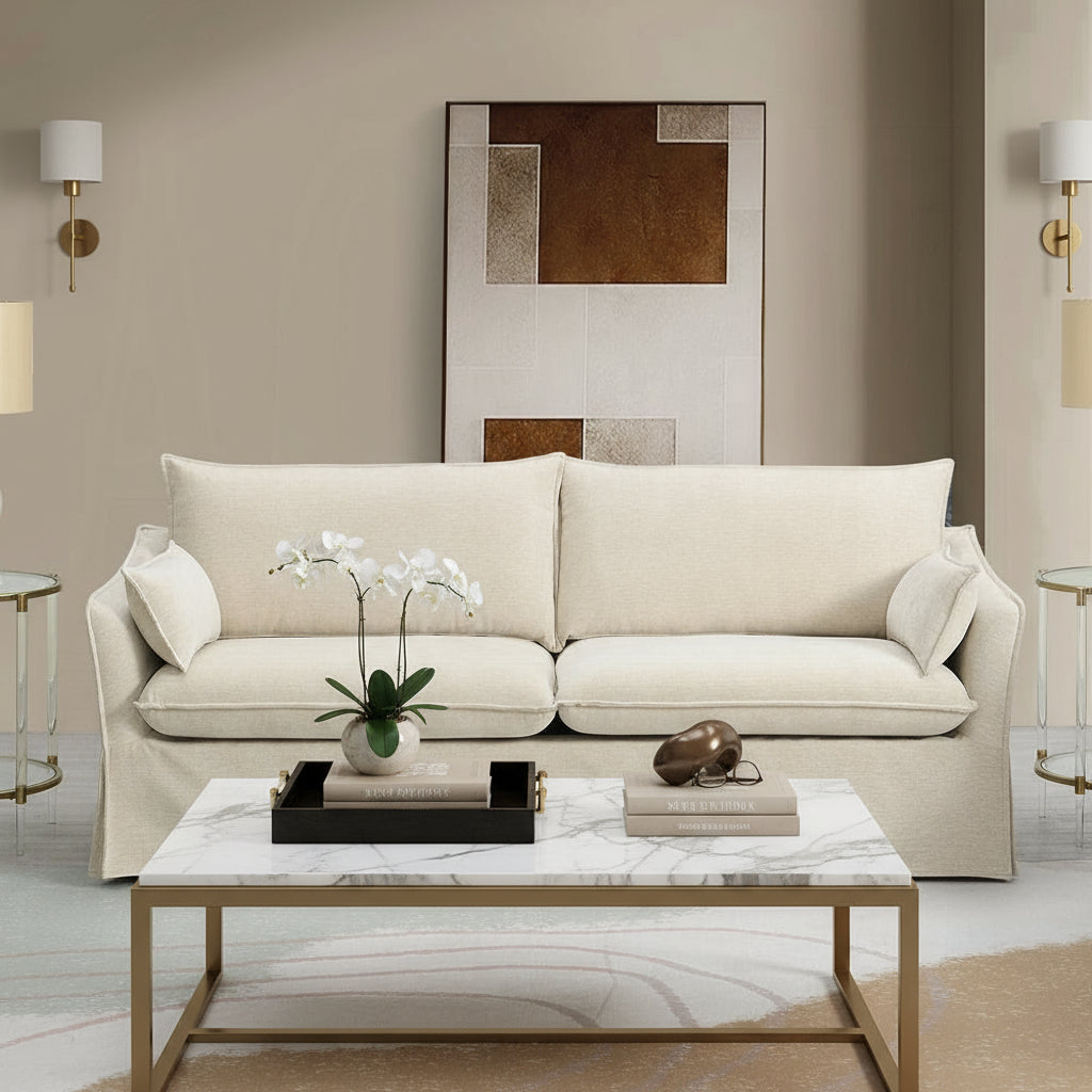 Beige sofa in a modern living room with abstract art on the wall.