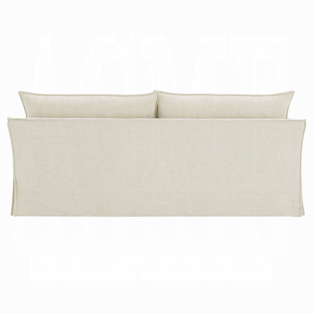 Set of three beige pillows on a white background
