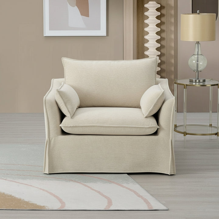 Beige armchair with cushions in a modern room setting