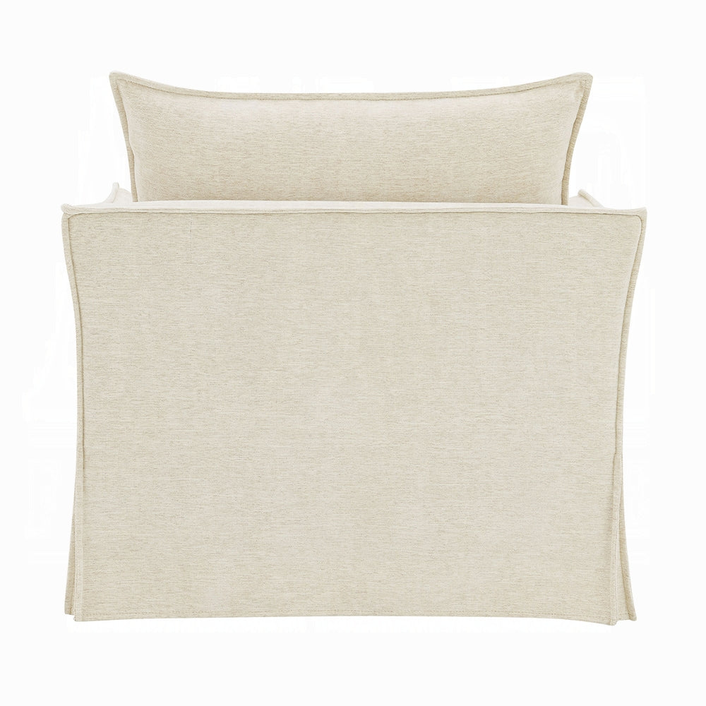 Beige bedspread and pillow on a white background
