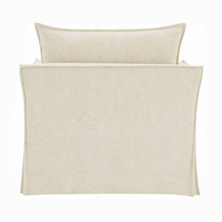 Beige bedspread and pillow on a white background