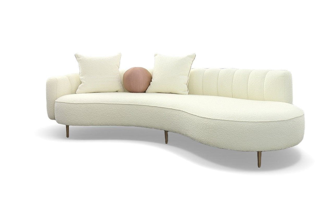 Modern white sofa with decorative cushions on a white background