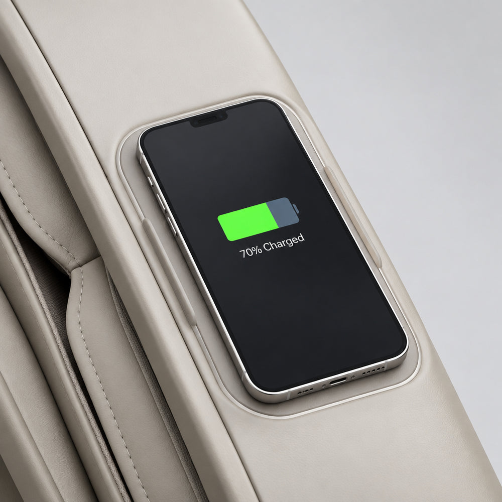 Built-in wireless smartphone charging pad with circular power status ring on the armrest.