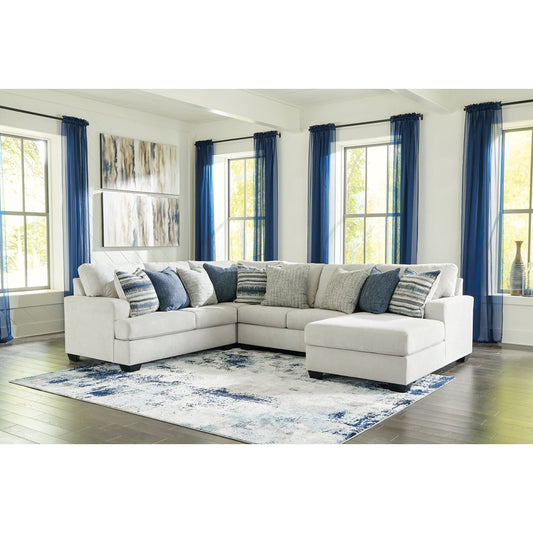 Benchcraft® Lowder 4-Piece Sectional with Chaise.