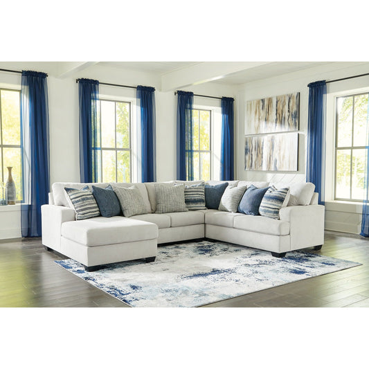 Benchcraft® Lowder 4-Piece Sectional with Chaise.