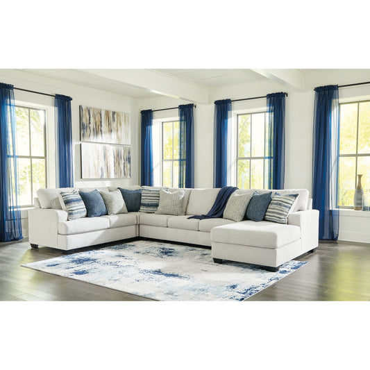 Benchcraft® Lowder 4-Piece Sectional with Chaise.