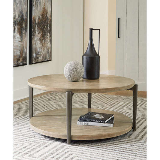 Signature Design by Ashley® Dyonton Round Cocktail Table.