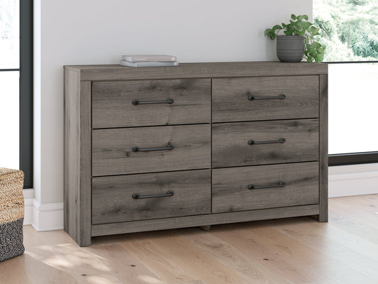 Signature Design by Ashley® Graystorm Six Drawer Dresser at   Contempo Furniture  Contempo Furniture Graystorm Six Drawer Dresser Signature Design by Ashley®.