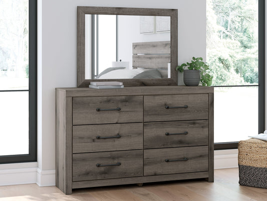 Signature Design by Ashley® Graystorm Dresser and Mirror at   Contempo Furniture  Contempo Furniture Graystorm Dresser and Mirror Signature Design by Ashley®.