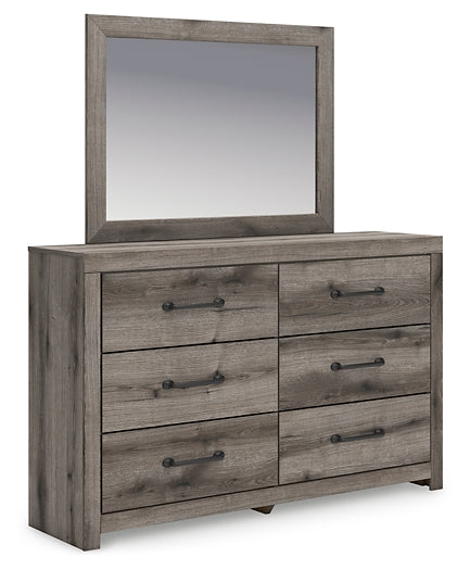 Signature Design by Ashley® Graystorm Dresser and Mirror at   Contempo Furniture  Contempo Furniture Graystorm Dresser and Mirror Signature Design by Ashley®.