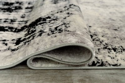 Zekeman 5'3" x 7'7" Rug - Black Accent Rug modern furniture Contempo Furniture